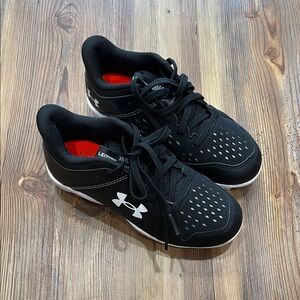 Youth Under Armour Black and White Cleats